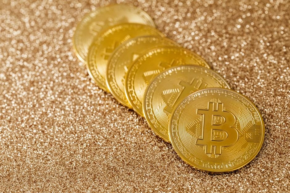 Pièces d'or symbolisant le Bitcoin